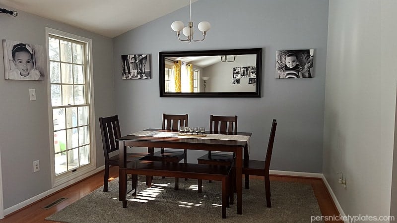 Before and after pictures of our living room/dining room done on a budget. Changing paint makes a huge difference - with Benjamin Moore Stonington Gray & Timber Wolf | Persnickety Plates