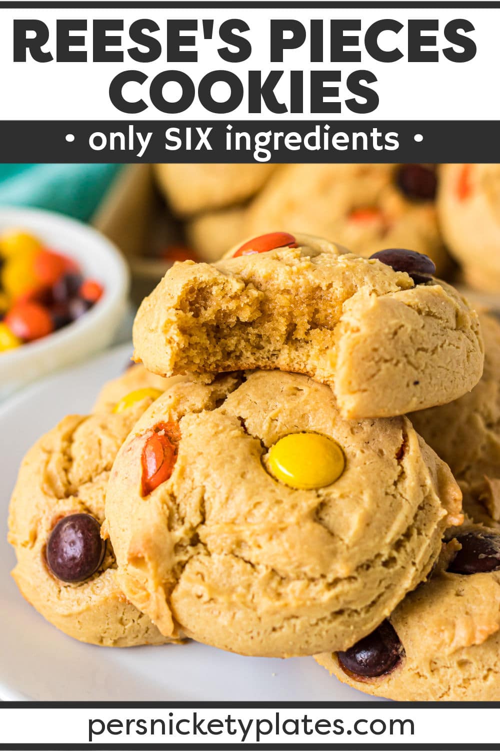 Only 6 ingredients in these easy Reese's Pieces Cookies made with cake mix! They are soft and pillowy and perfect for peanut butter lovers. | www.persnicketyplates.com