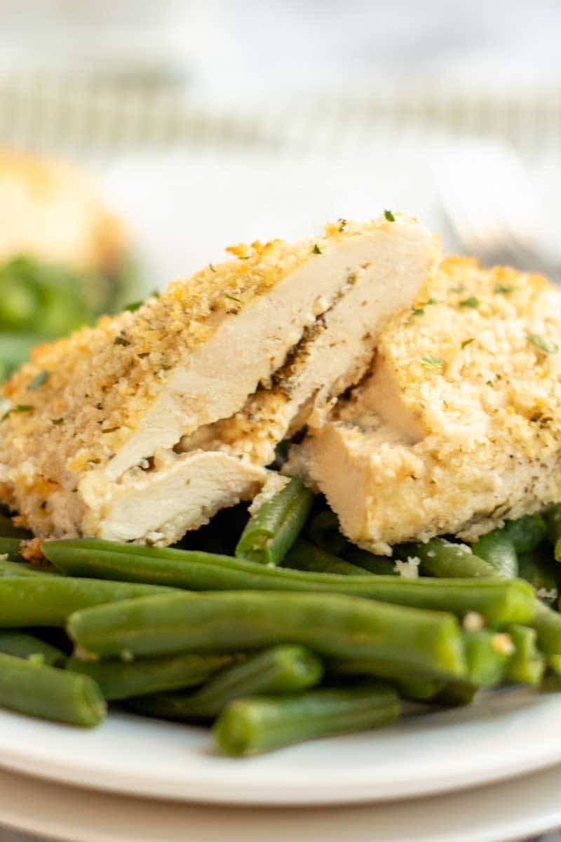 Laughing Cow Chicken is a lightened up version of a stuffed chicken breast. This super easy, 5 ingredient dinner will please your picky eaters and wow your foodies. | www.persnicketyplates.com