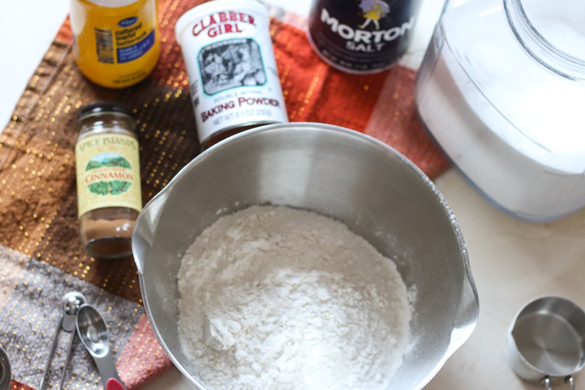 mixing bowl and ingredients set up to make quick bread 