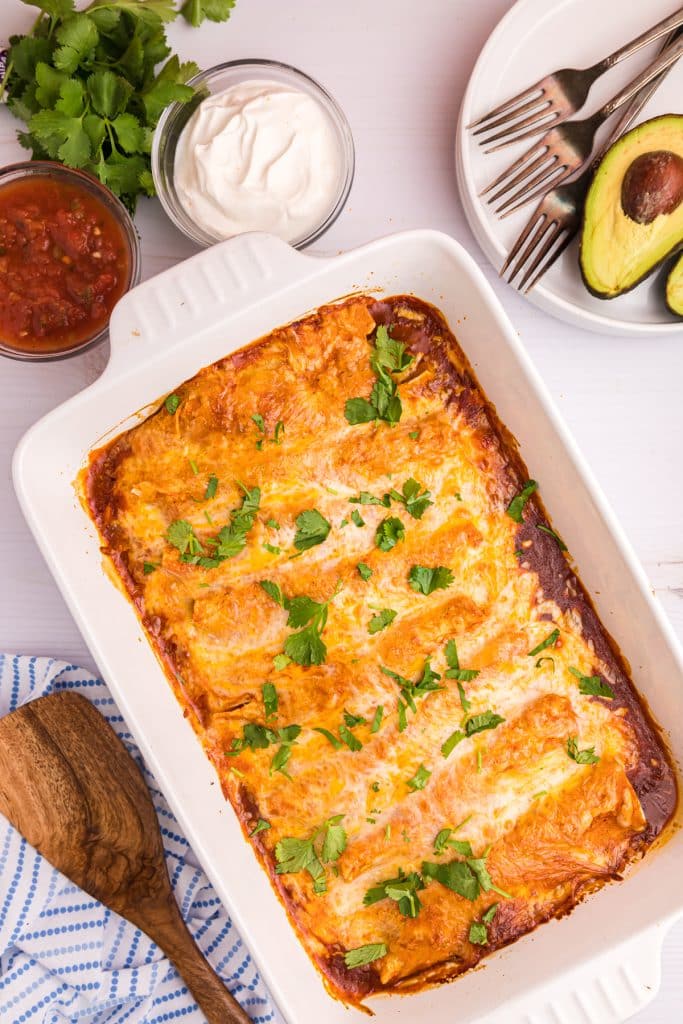 beef enchiladas topped with melted cheese & cilantro.