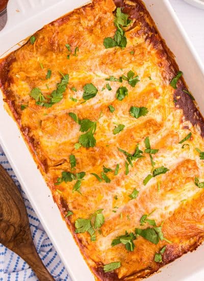 overhead shot of a baking dish of beef enchiladas.
