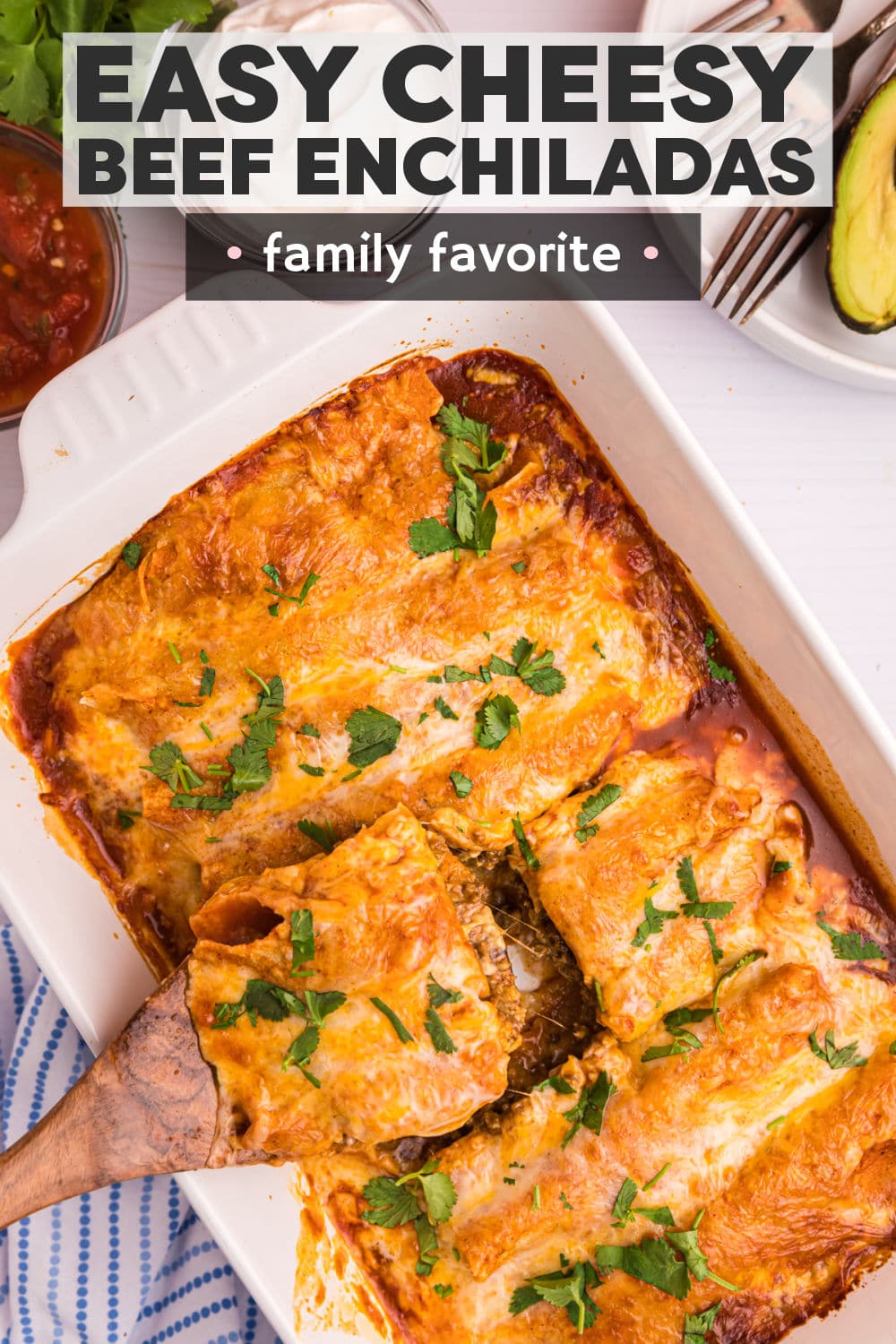 This easy Ground Beef Enchiladas recipe starts with tortillas that are filled with a seasoned ground sirloin mixture, topped with a flavorful enchilada sauce, sprinkled with shredded colby jack, and baked until cheesy and gooey. | www.persnicketyplates.com