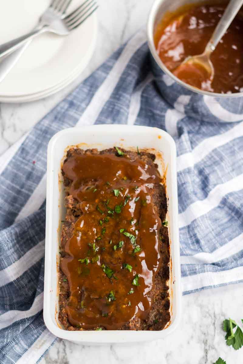 meatloaf with brown gravy in loaf pan 