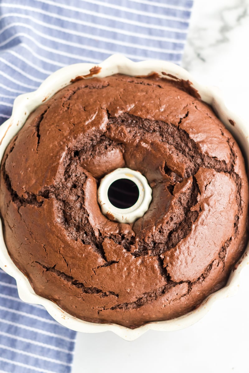 overhead shot of chocolate bundt cake in pan 