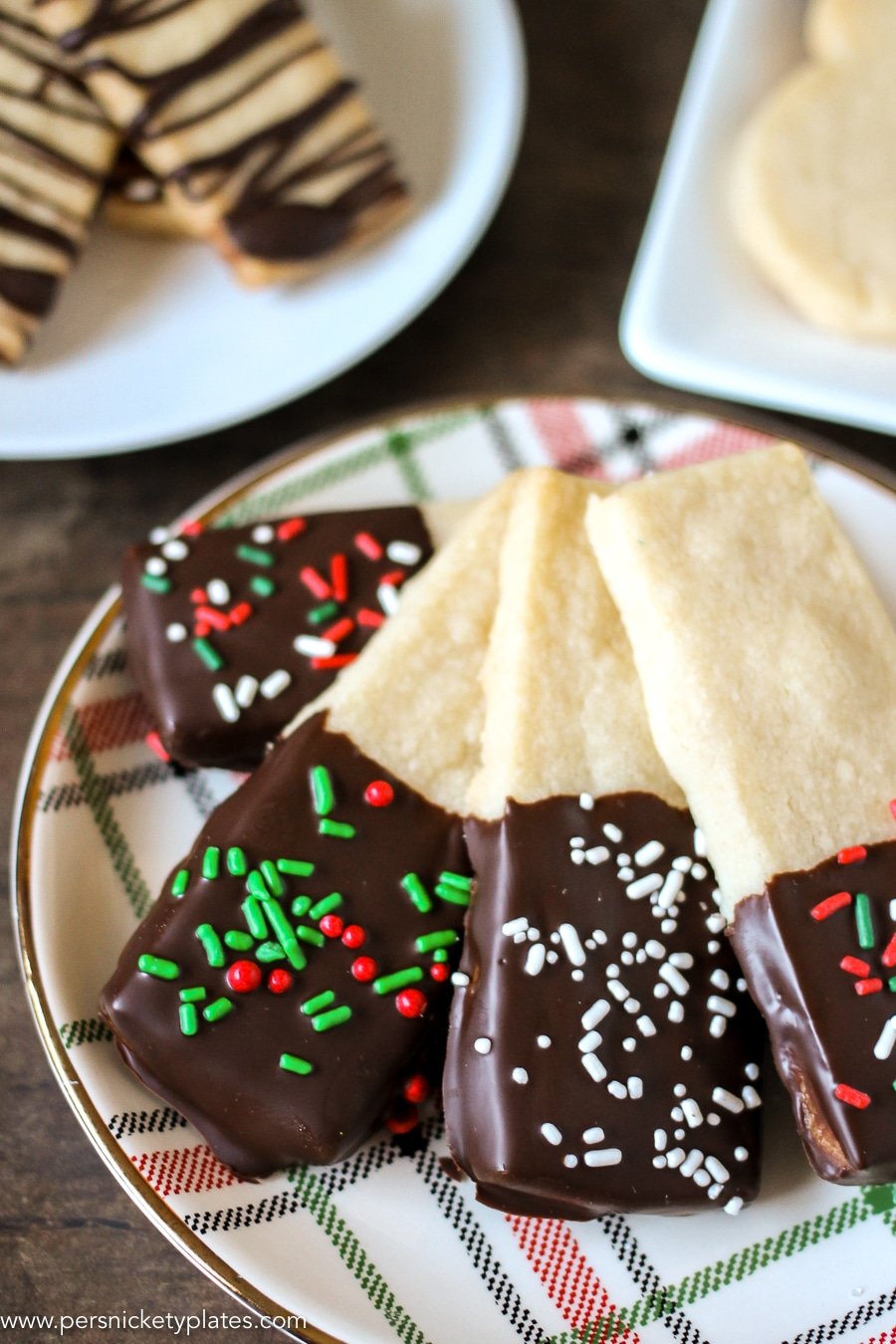 plate of christmas chocolate dipped shortbread cookies