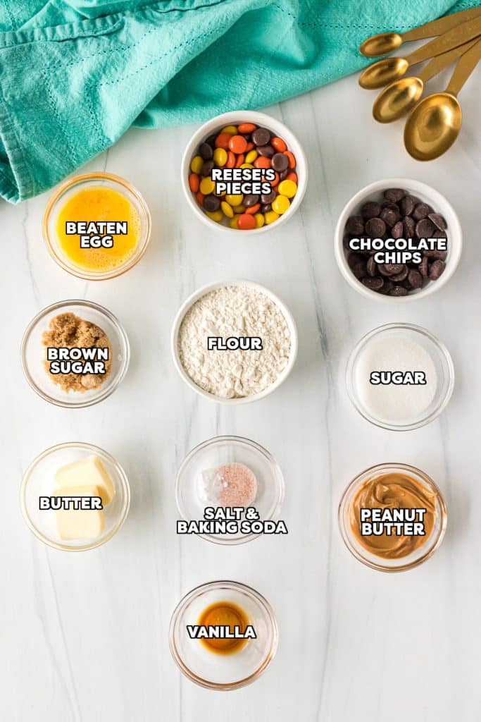 overhead shot of labeled ingredients laid out to make a giant peanut butter cookie.