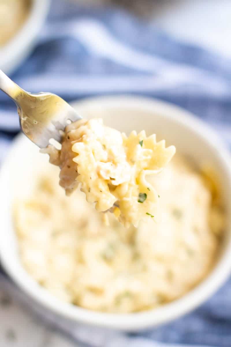 fork full of creamy ranch chicken made in the crockpot