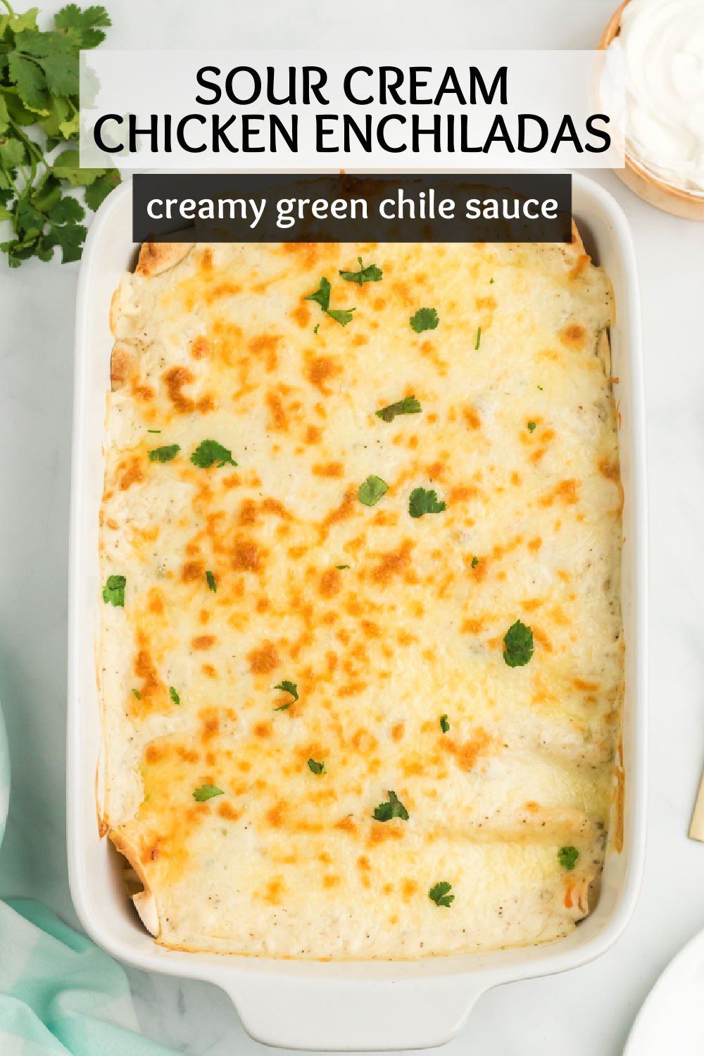 This easy sour cream chicken enchilada recipe starts with flour tortillas that are filled with a seasoned shredded chicken mixture, topped with an amazing sour cream sauce, and baked until cheesy and gooey.  | www.persnicketyplates.com