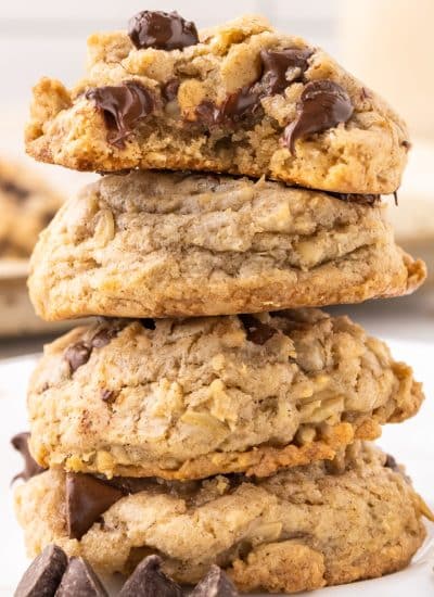 stack of oatmeal chocolate chip cookies with melty chocolate chips.