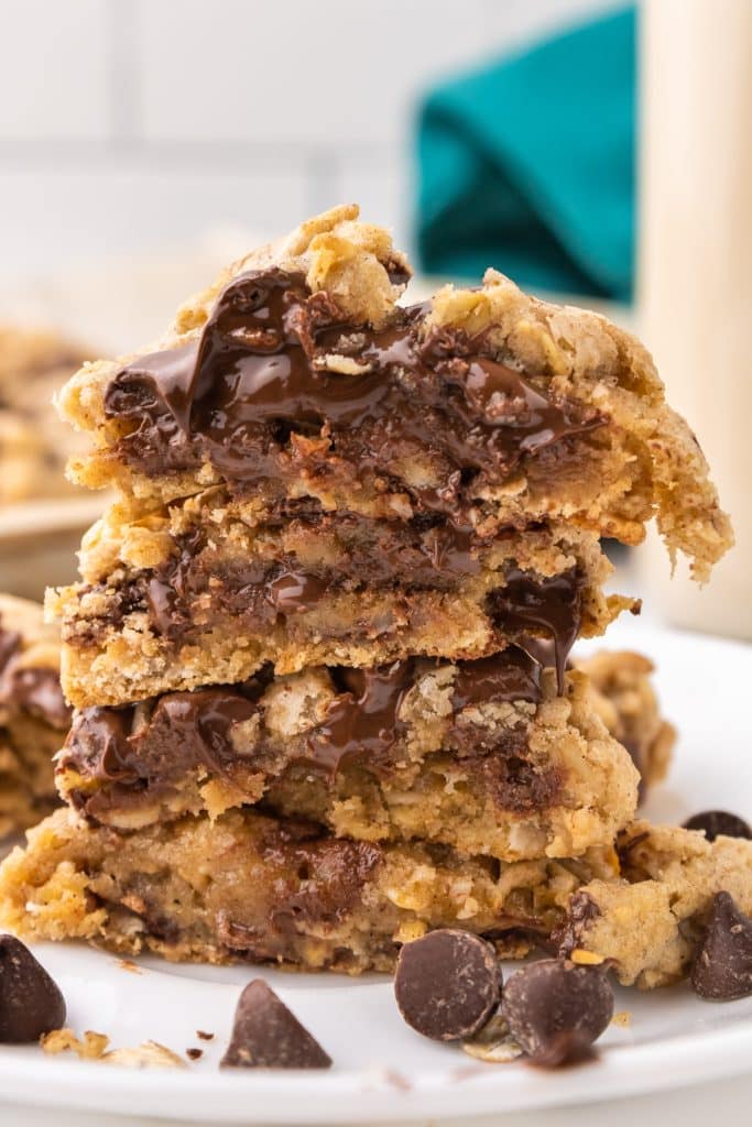 stack of melty, gooey, oatmeal chocolate chip cookies.