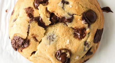 overhead shot of a giant single serve chocolate chip cookie.