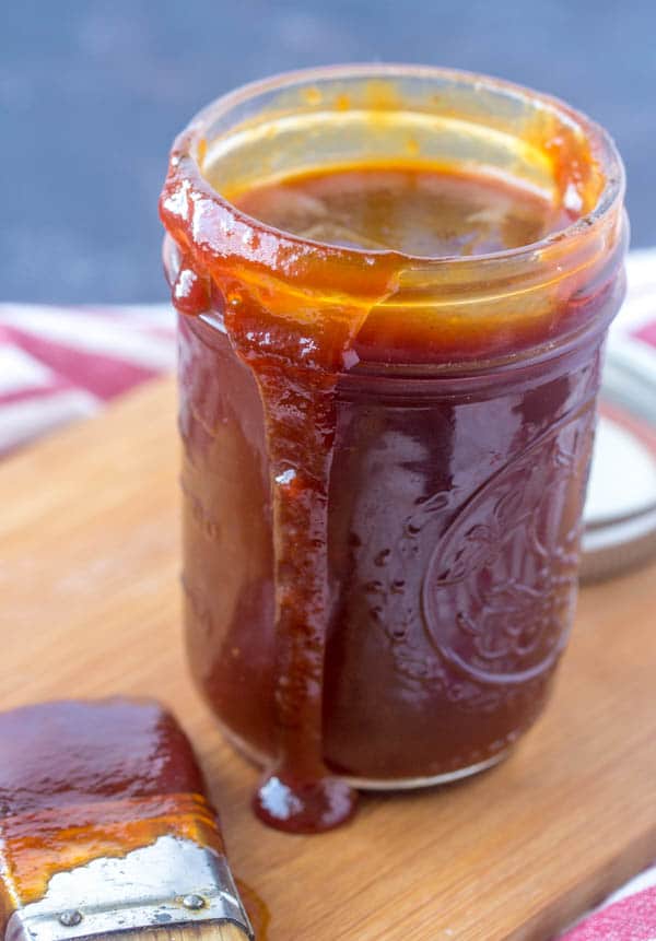 overflowing mason jar of bbq sauce