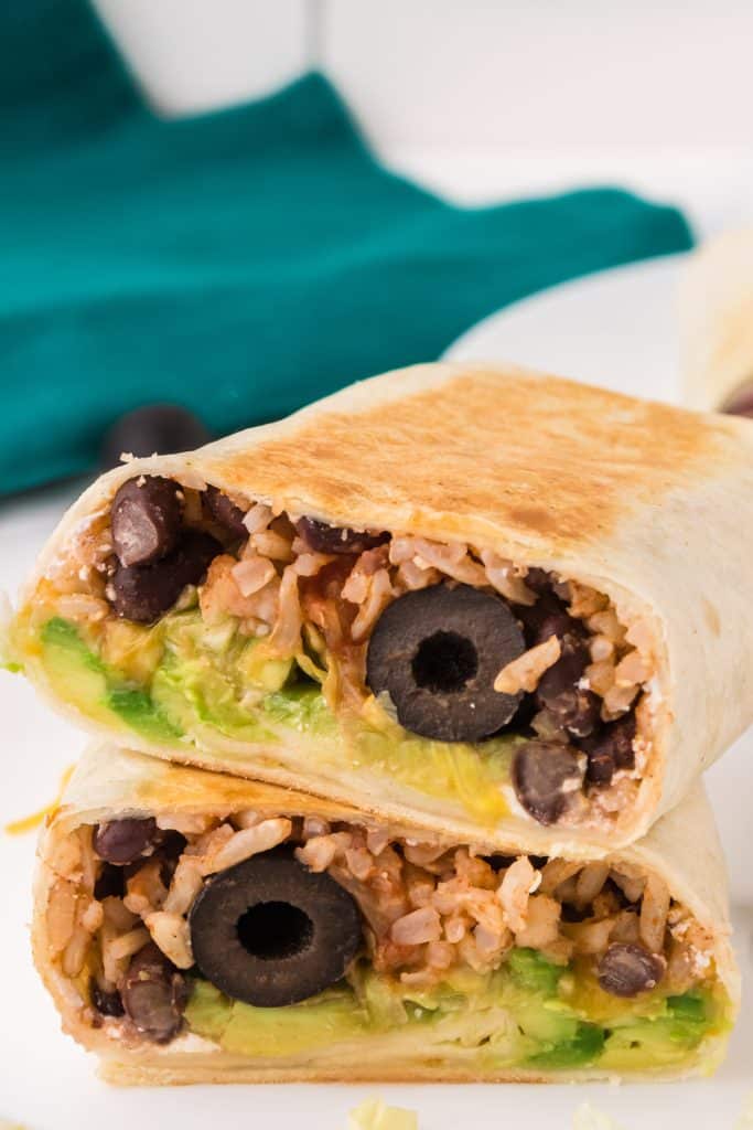 black bean wrap cut in half, stacked on top of itself.