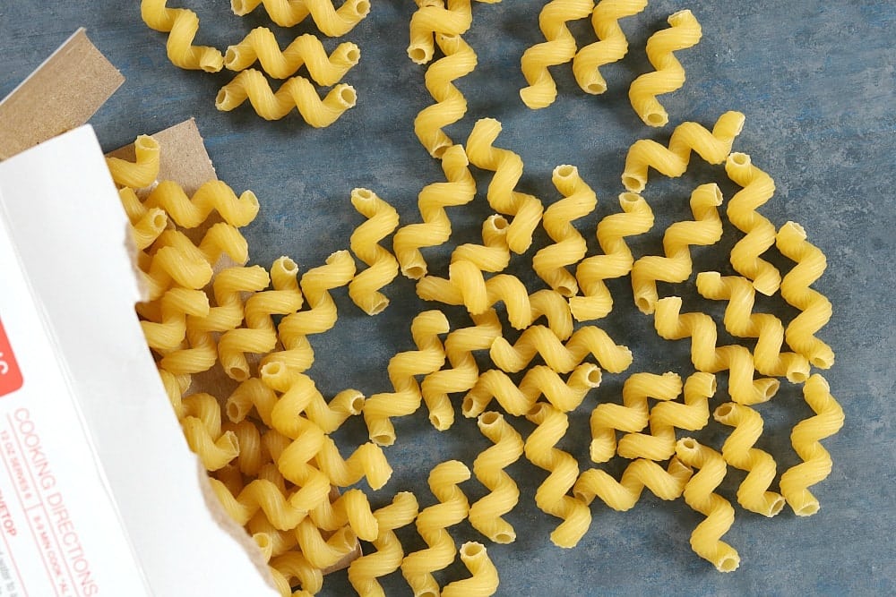 box of spilled cavatappi pasta noodles