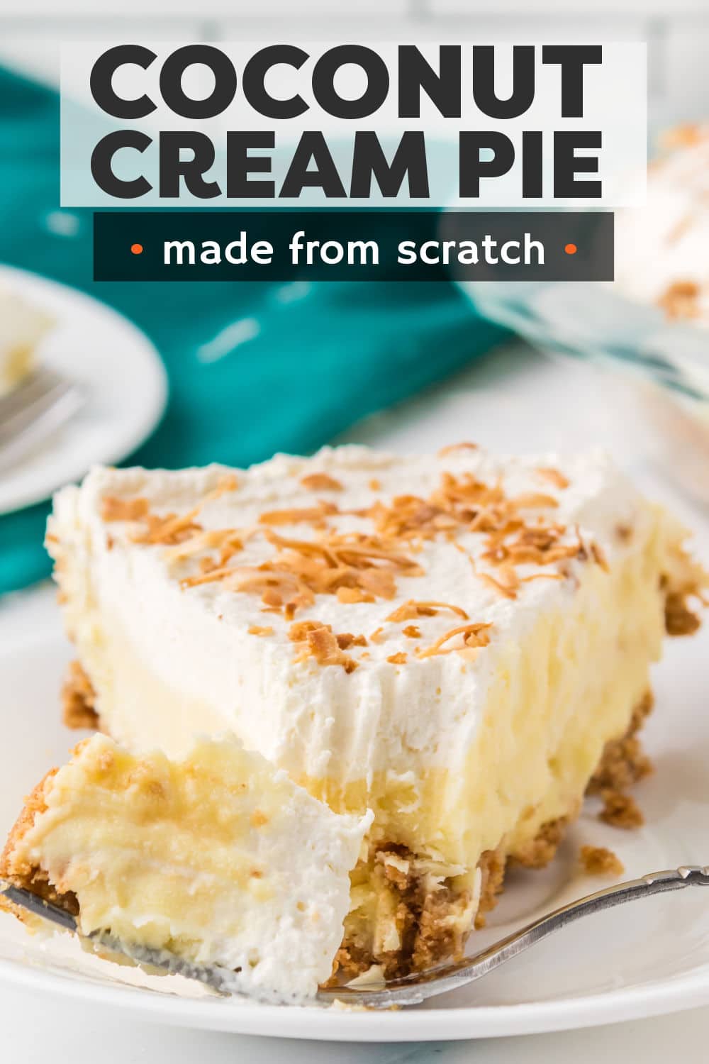 This coconut cream pie is entirely made from scratch and worth the effort. A thick coconut cream filling in a graham cracker crust, topped with fluffy whipped cream and toasted coconut. Tons of coconut flavor and the perfect creamy texture. | www.persnicketyplates.com