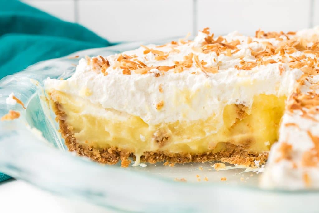 side view of the inside of a coconut cream pie.