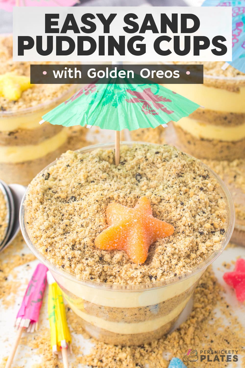 Golden Oreo Sand Pudding is such a fun summer treat! You make Oreo cookie "sand" and layer it with pudding to create a beach themed dessert that looks just like sand. Serve it out of a bucket for a crowd or individual pudding cups.  | www.persnicketyplates.com