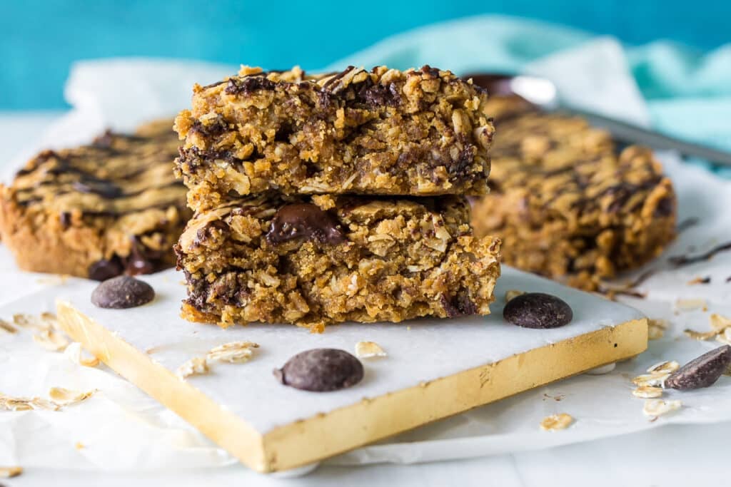 stack of peanut butter oatmeal bars on a coaster.