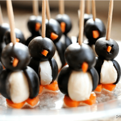 penguins made out of black olives, mozzarella balls, and carrot feet. Held together with toothpicks.
