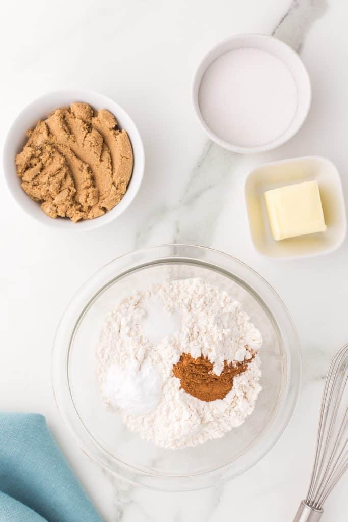 dry ingredients in a glass mixing bowl for cookies.