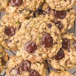pile of zucchini oatmeal cookies with chocolate chips.