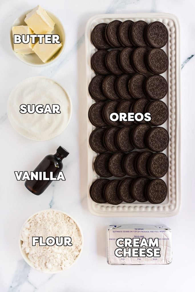 overhead shot of labeled ingredients laid out to make oreo cheesecake cookies.