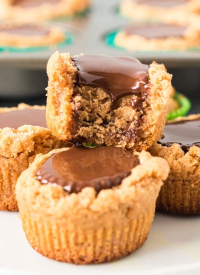 peanut butter cookie cup with a bite taken out of it.