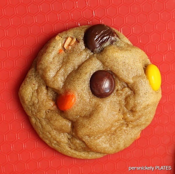 close up reese's pieces cookie on a red mat