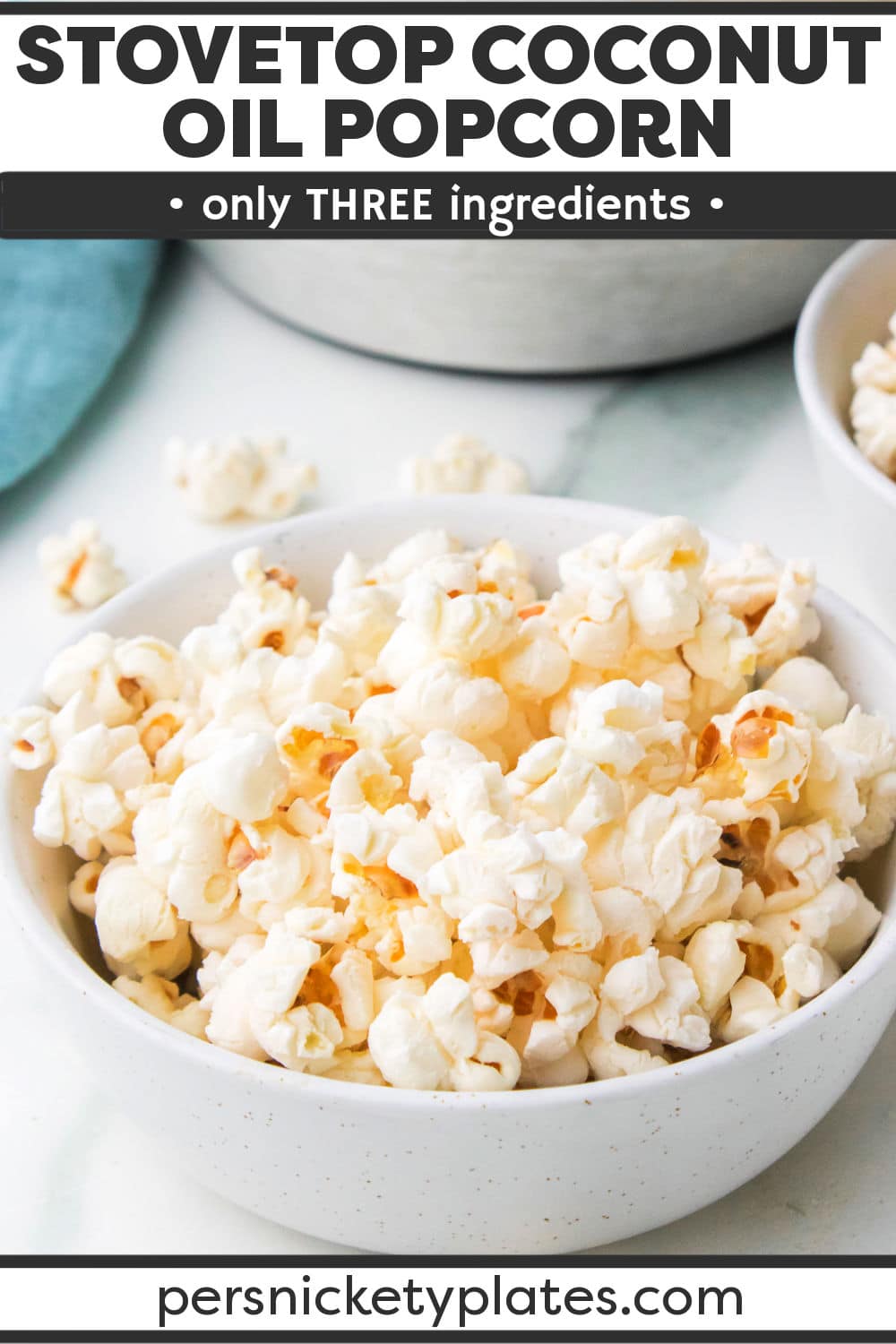 Healthy coconut oil popcorn makes the perfect snack! Full of buttery flavor without any of the butter. Made with just two ingredients and then topped with your favorite seasonings. | www.persnicketyplates.com