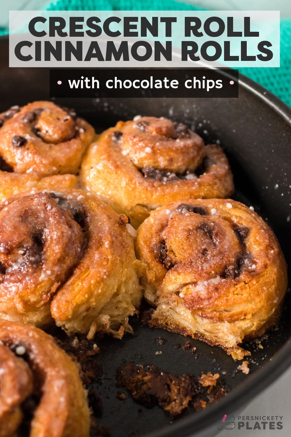 Cinnamon rolls made with crescent rolls will be your new best brunch idea! These chocolate chip crescent roll cinnamon rolls take less than 10 minutes to prep and seconds to eat! Perfect with your morning coffee or on the go breakfast. | www.persnicketyplates.com