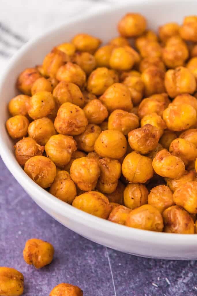 white bowl filled with roasted chickpeas.