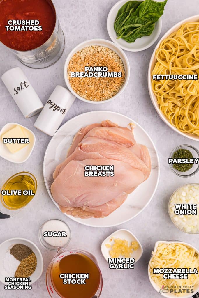 overhead shot of labeled ingredients laid out to make mozzarella chicken.