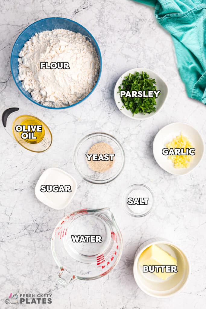 overhead shot of labeled ingredients laid out to make garlic knots.