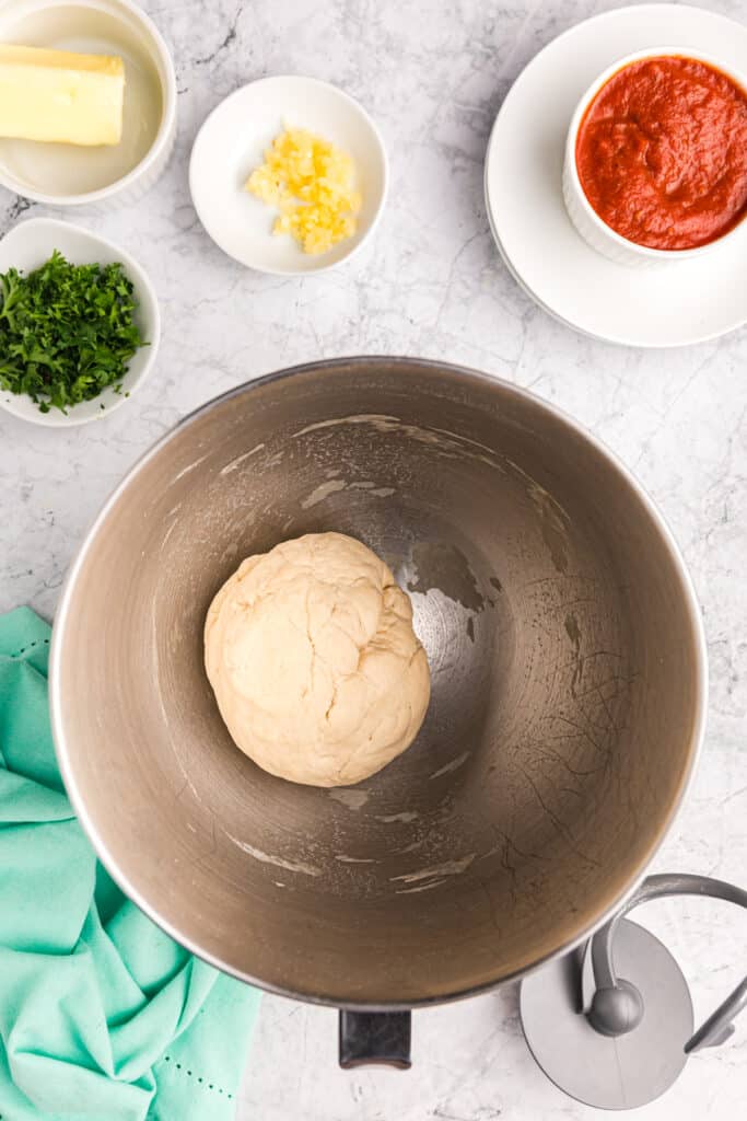 dough ball in a mixing bowl.