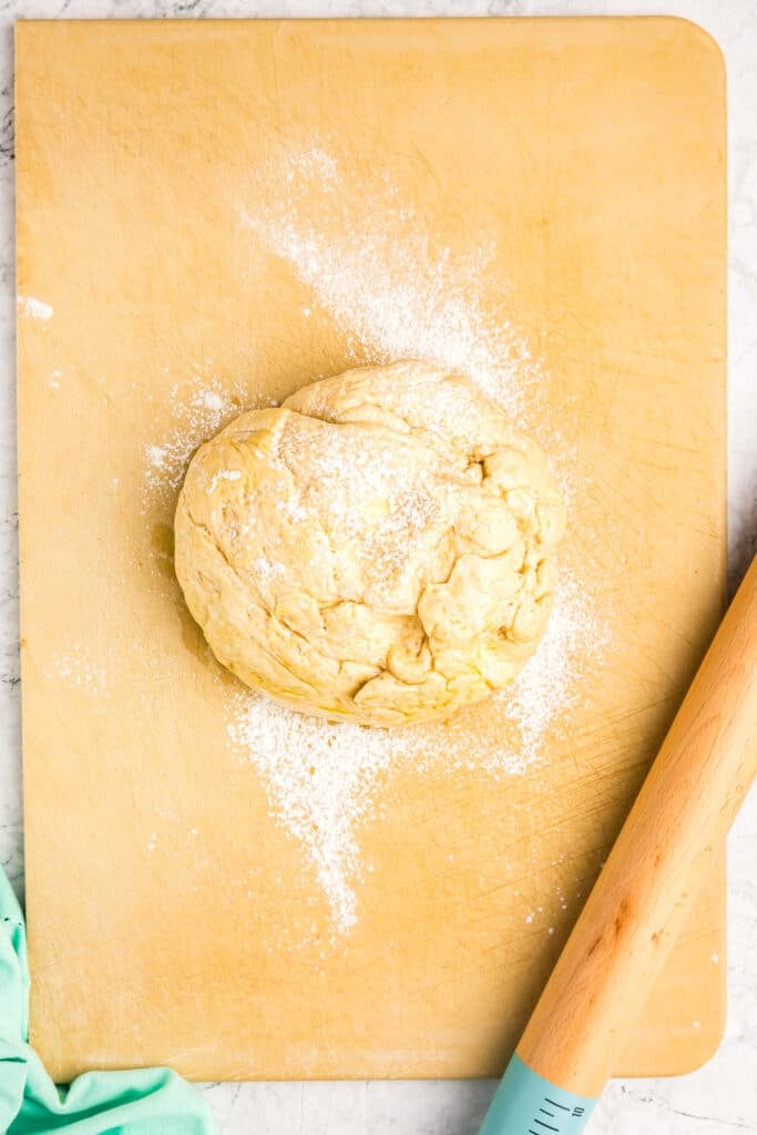 ball of dough and a rolling pin.