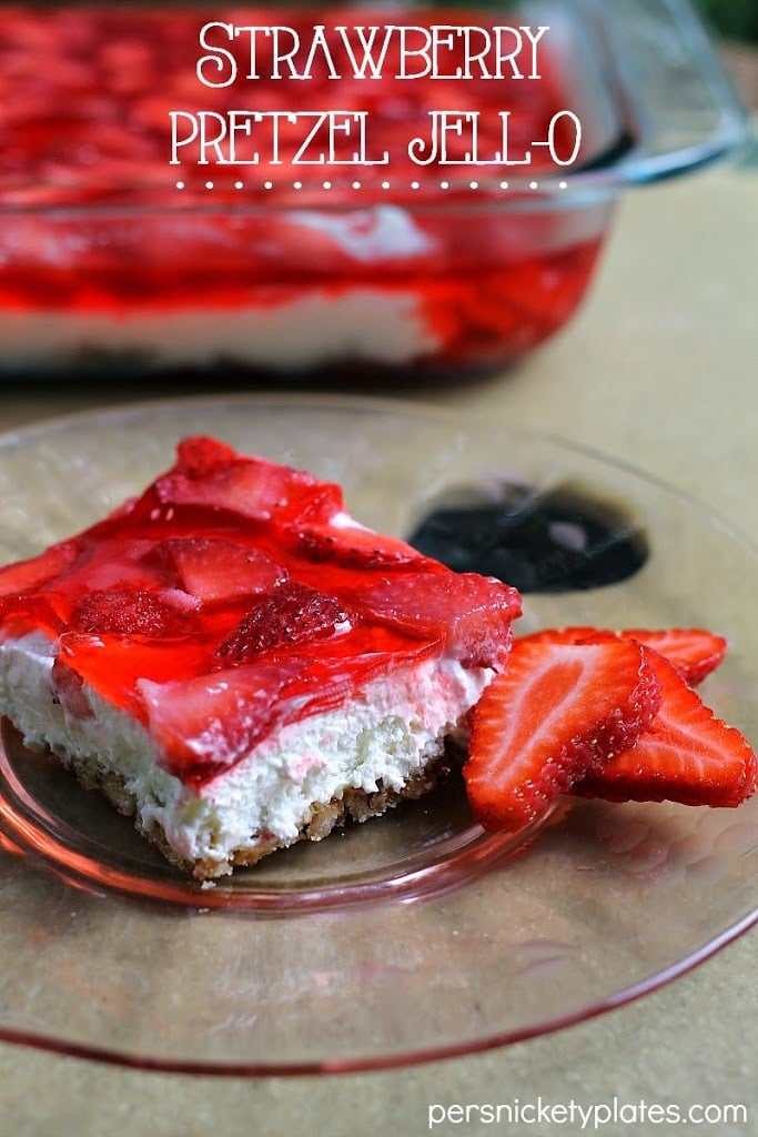 This Strawberry Pretzel Jell-O is a quick and easy summer dessert idea. Made with fresh strawberries nestled in Jell-O on top of a whipped cream layer and crunchy pretzel crust.