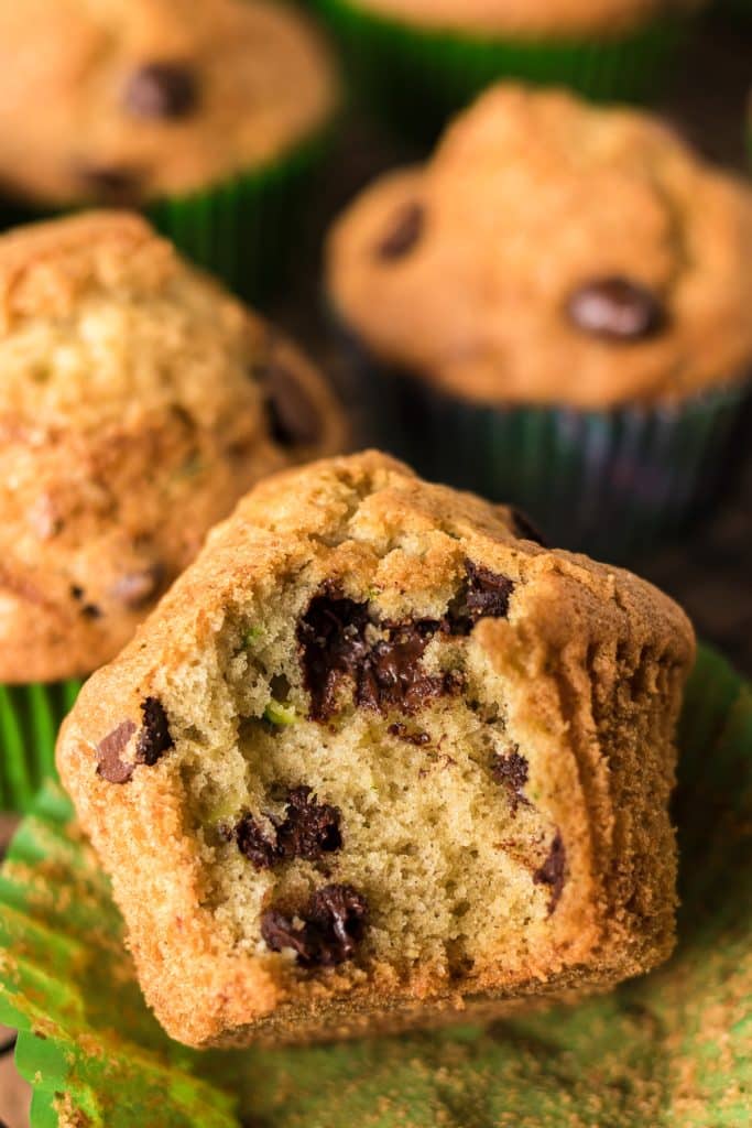 chocolate chip zucchini muffin with a bite missing.