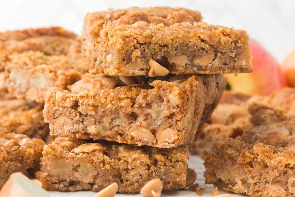 stack of 3 apple blondies with peanut butter chips.