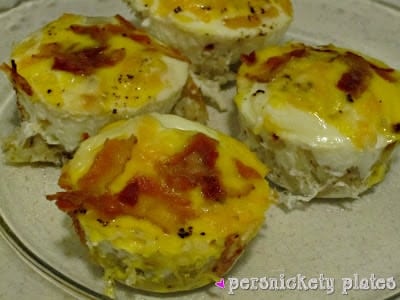 bird's nest breakfast cups topped with bacon