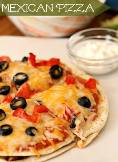 mexican pizza on a white plate