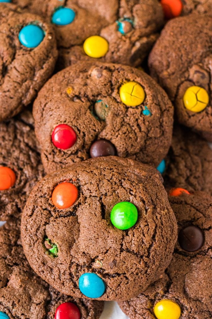 closeup of pile of brownie M&M cookies.