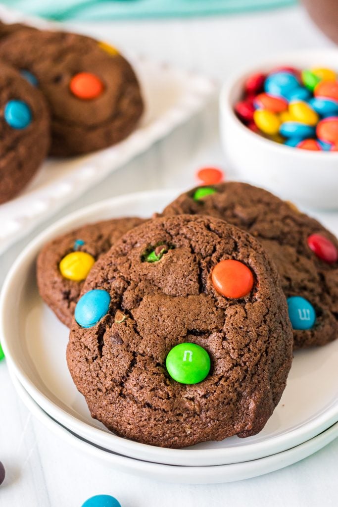 plate of brownie cookies filled with M&Ms.