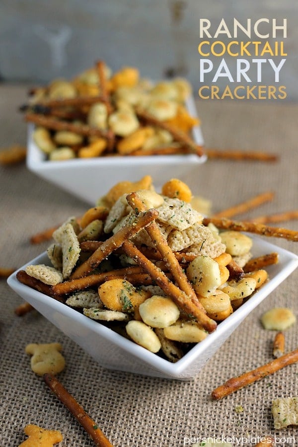 two bowls of cracker mix with text overlay reading "ranch cocktail party crackers"