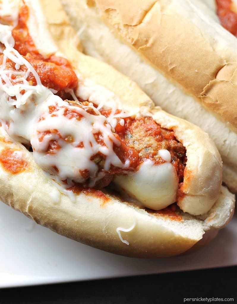 Easy Chicken Chicken Meatballs Subs smothered in marinara and topped with provolone and mozzarella cheese! | Persnickety Plates