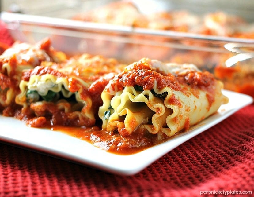These Veggie Lasagna Roll-Ups are filled with spinach, zucchini, and cheeses and smothered in Classico Riserva's new Eggplant and Artichoke sauce. | Persnickety Plates