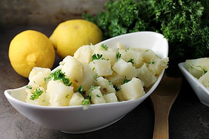 Super simple Arabic Potato Salad only has a few ingredients - potatoes, lemon, oil, garlic, and parsley – but is full of flavor and because there is no mayonnaise, it’s great for a picnic! | Persnickety Plates