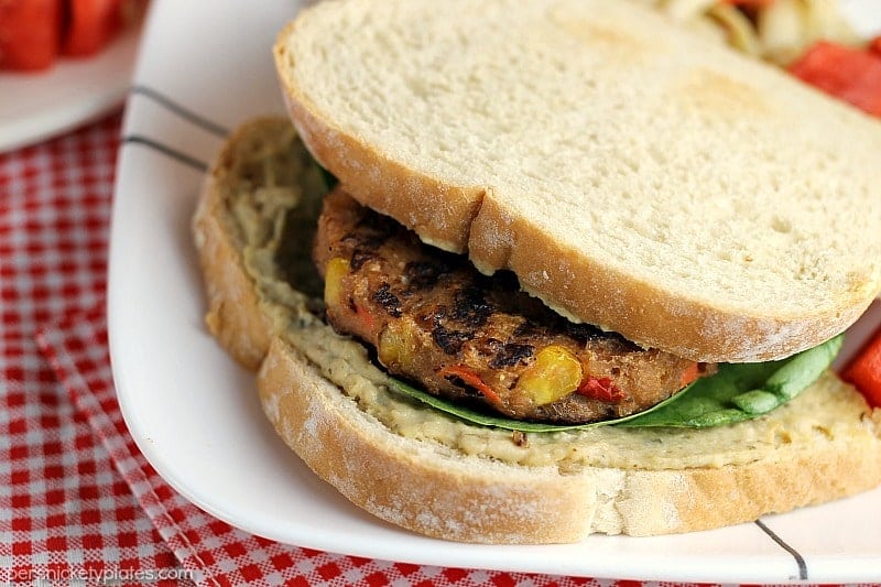 Vegetarians can enjoy barbecues, too! This Veggie Burger with Spinach and Hummus is the perfect alternative to traditional hamburgers for your next BBQ. | Persnickety Plates