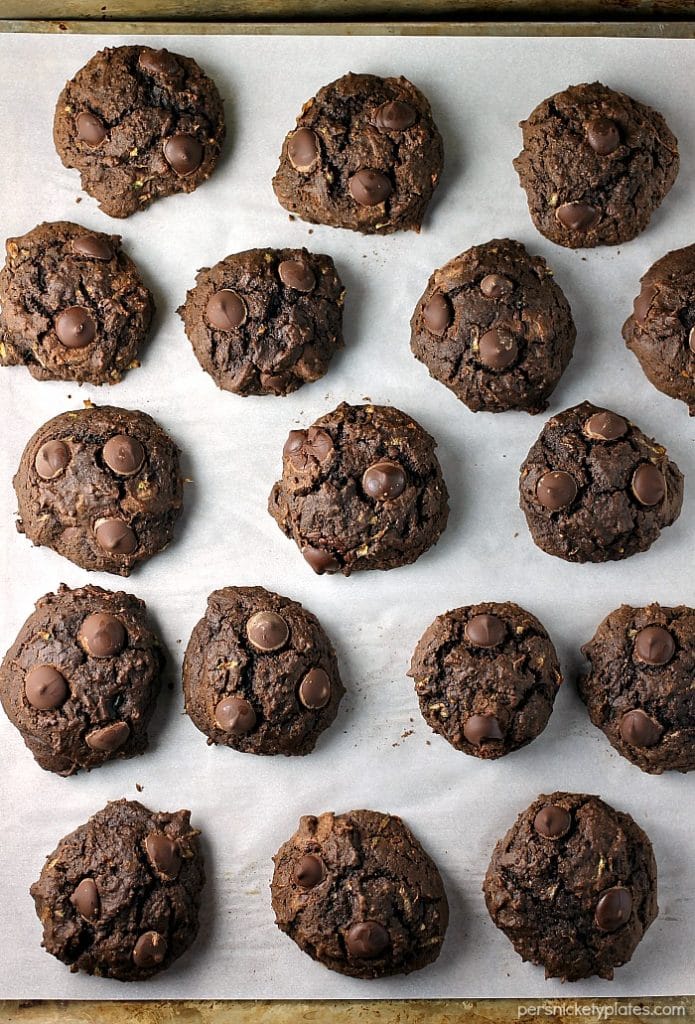 Chocolate Zucchini Drop Cookies are a sweet way to use up some of your zucchini crop. You end up with a moist, chocolatey cookie that's filled with chocolate chips but you don't even have to get out your mixer! | Persnickety Plates