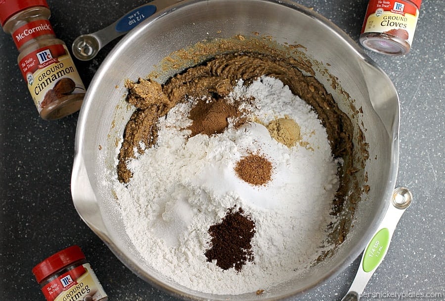 mixing bowl filled with ginger snaps ingredients